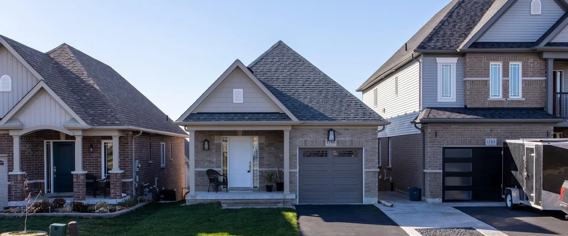 A house featuring two garages
