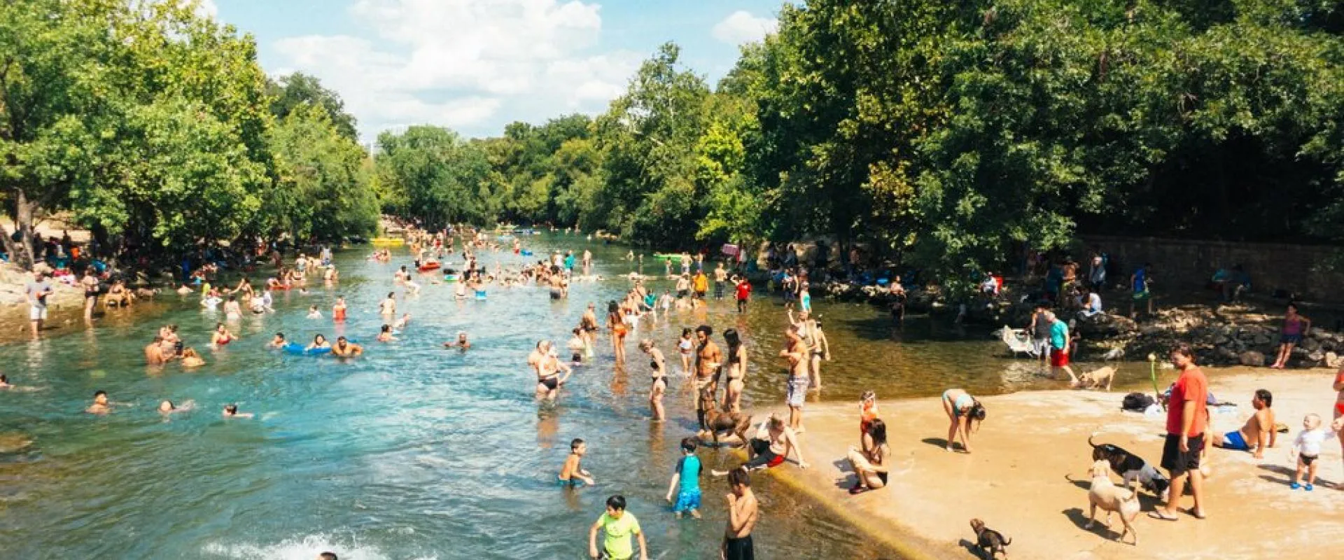 People swimming in a lake