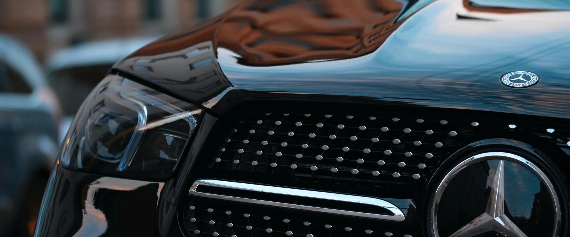Close-up of a black Mercedes front grille